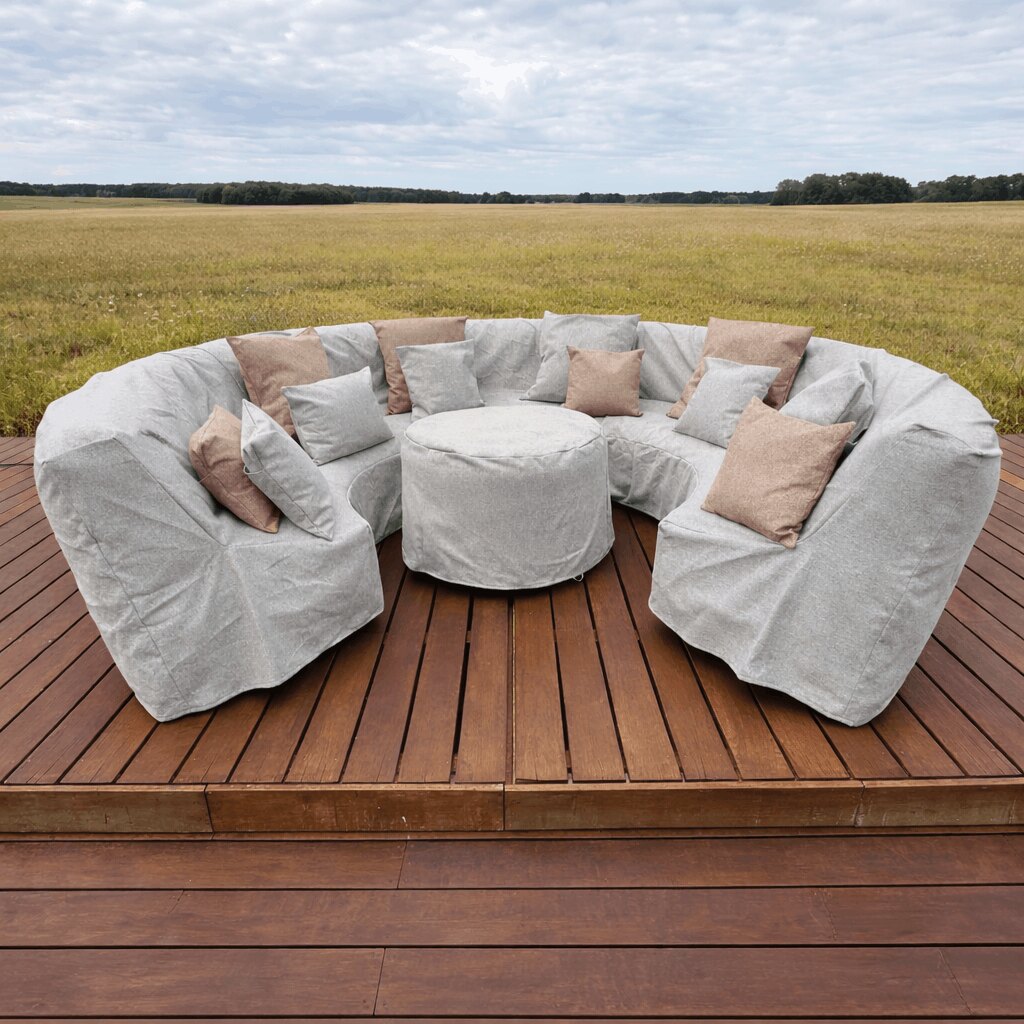 Canapé gonflable FATPOP 300 beige avec coussins sur une terrasse