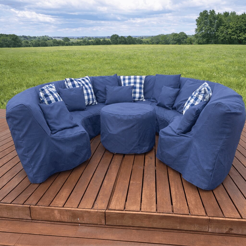 Canapé gonflable FATPOP bleu avec coussins sur une terrasse